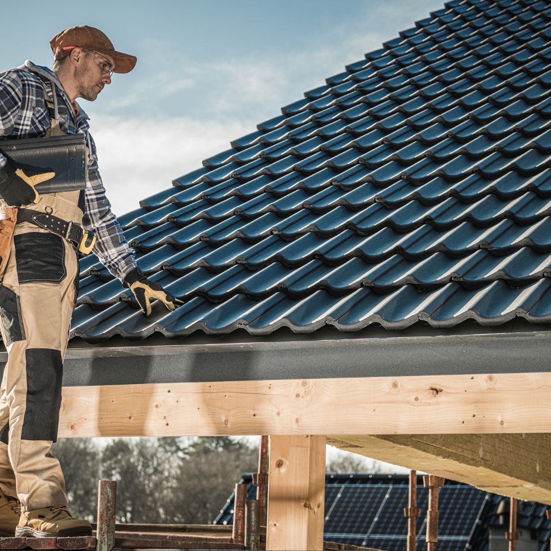 roofer inspecting a roof