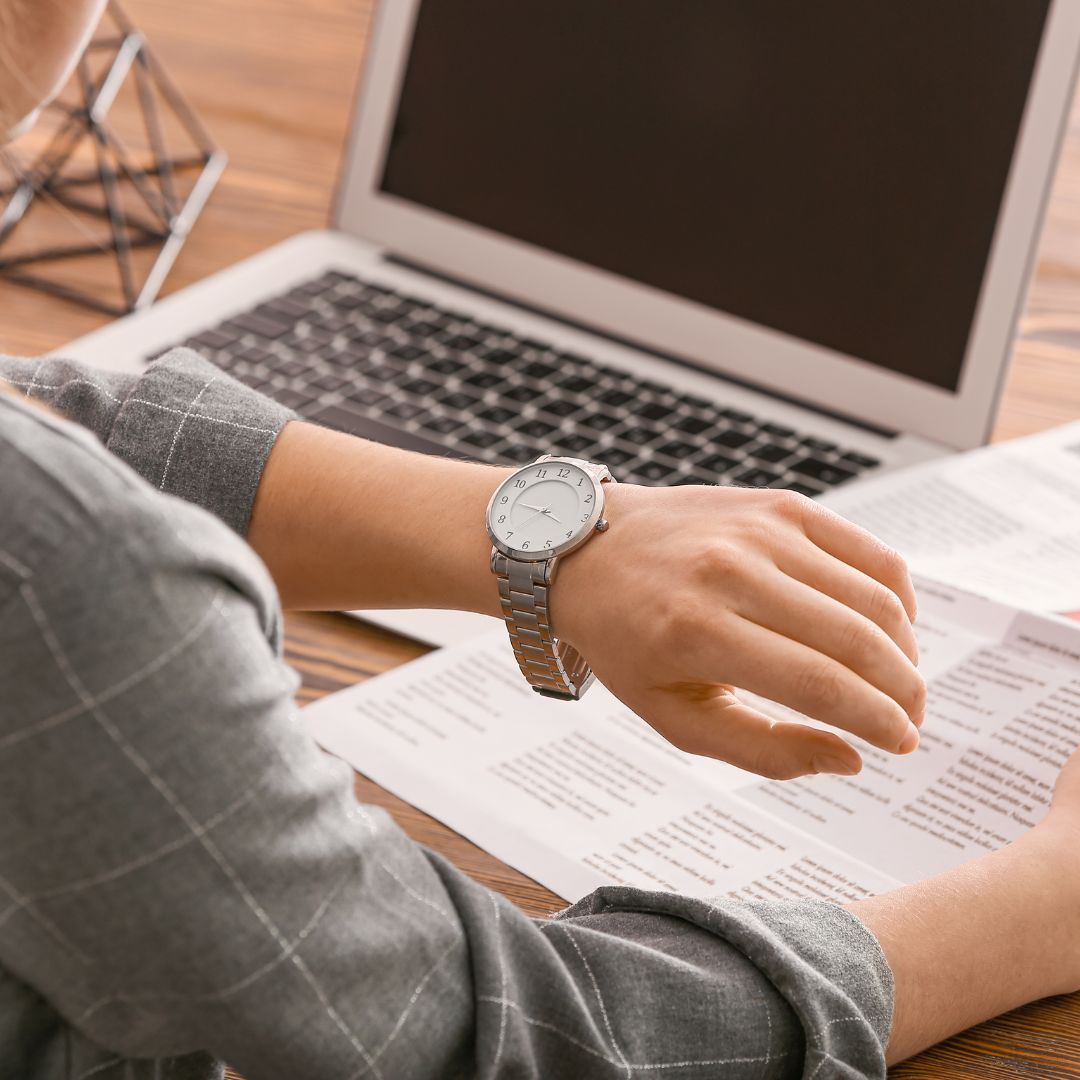 Someone looking at their watch